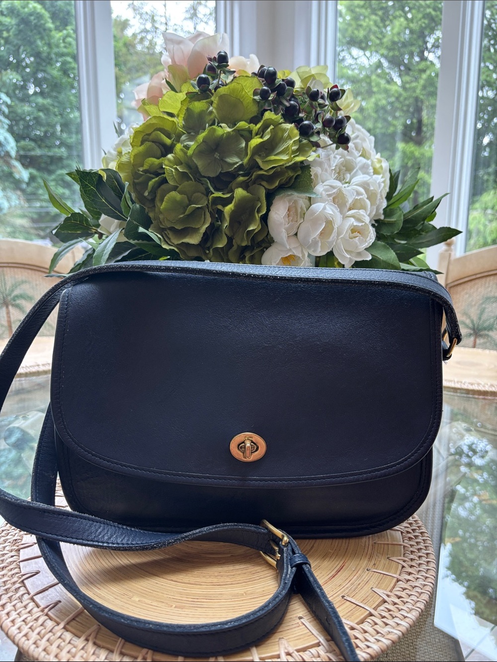 Coach Navy Vintage City Bag in leather with a brass turnlock closure.